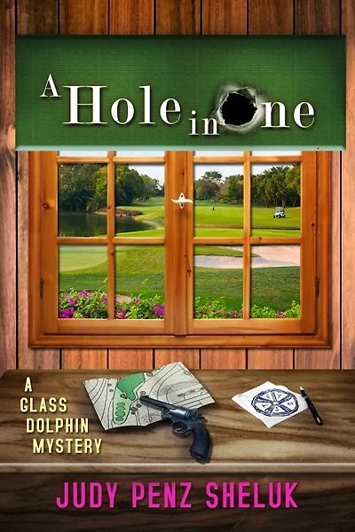 A Hole In One: A Glass Dolphin Mystery