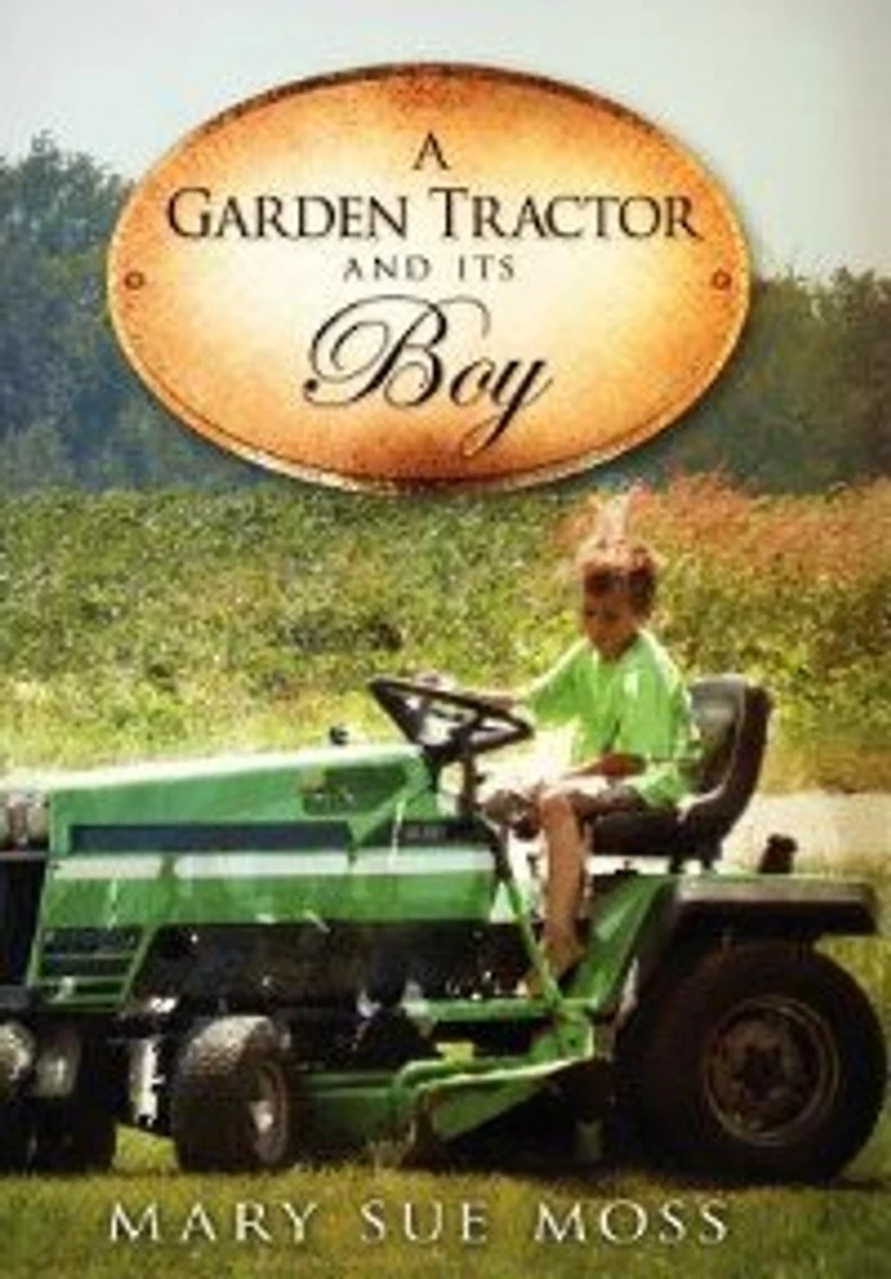 A Garden Tractor And Its Boy