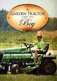 A Garden Tractor And Its Boy