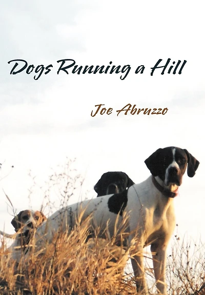 Dogs Running A Hill