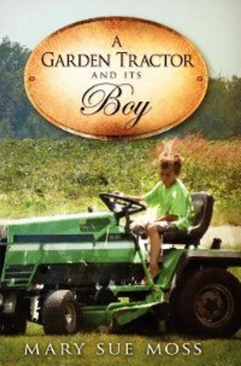A Garden Tractor And Its Boy