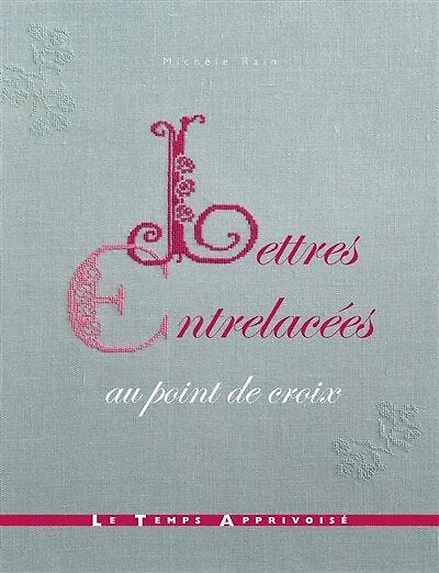 Lettres entrelacées au point de croix