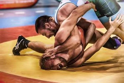 Monsoon Muscle: A Wrestler’s Forbidden Fire in Varanasi