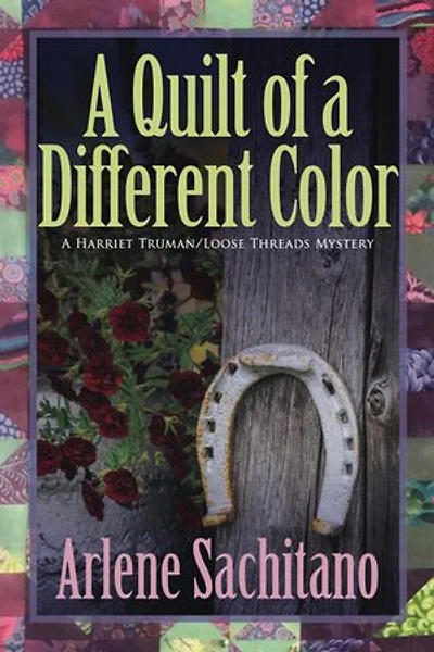 A Quilt of a Different Color: Harriet Truman/Loose Threads Mystery, #13