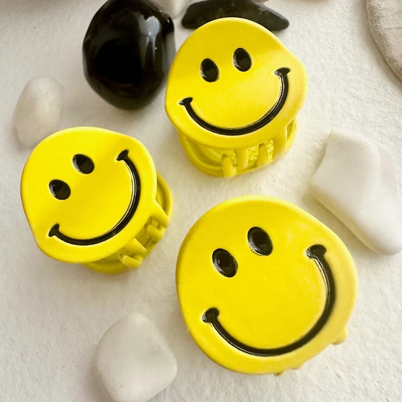 DONT WORRY BE HAPPY HAPPY FACE HAIR CLAW
