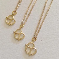 Salty Tiny Pretzel Pendant Necklace.