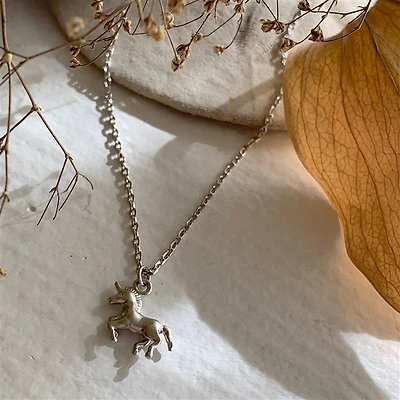 Astra Tiny Unicorn Pendant
