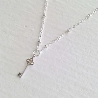 Minerva Tiny Key Chain