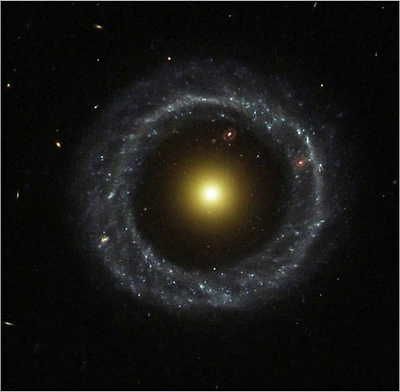 NASA Feature Archive Young Stars Flicker Amidst Clouds of Gas and Dust