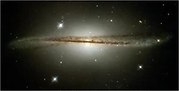 Hubble Photographs Warped Galaxy as Camera Passes Milestone