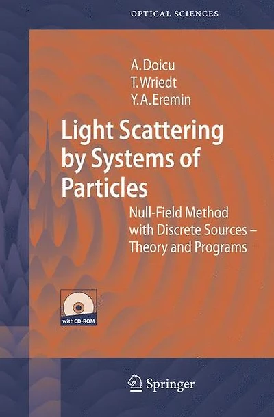 Light Scattering by Systems of Particles: Null-Field Method with Discrete Sources: Theory and Programs