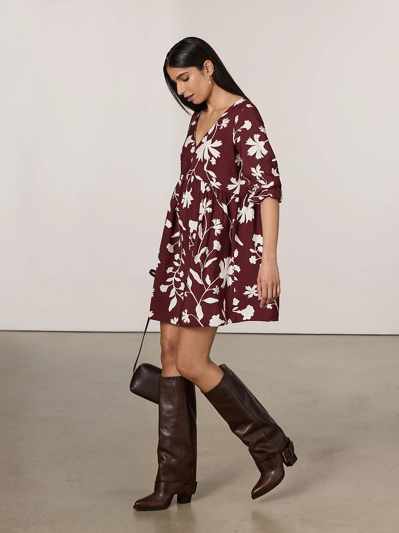 Robe à taille empire manches longues et col V