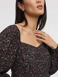 Robe bustier à manches longues bouffantes et encolure en coeur