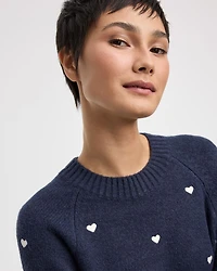 Pull à manches longues et col rond avec coeurs