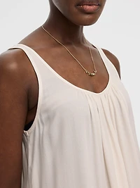 Camisole à col dégagée avec ourlet asymétrique volants