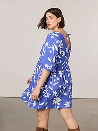 Robe à taille empire manches longues et col V