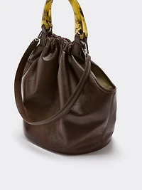 Sac en faux cuir avec poignée rigide