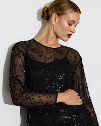 Robe mini en mesh à manches longues