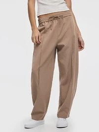 Pantalon à jambe ballon plis nervurés