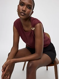 Extended-Sleeve Crew-Neck Sweater with Brooch