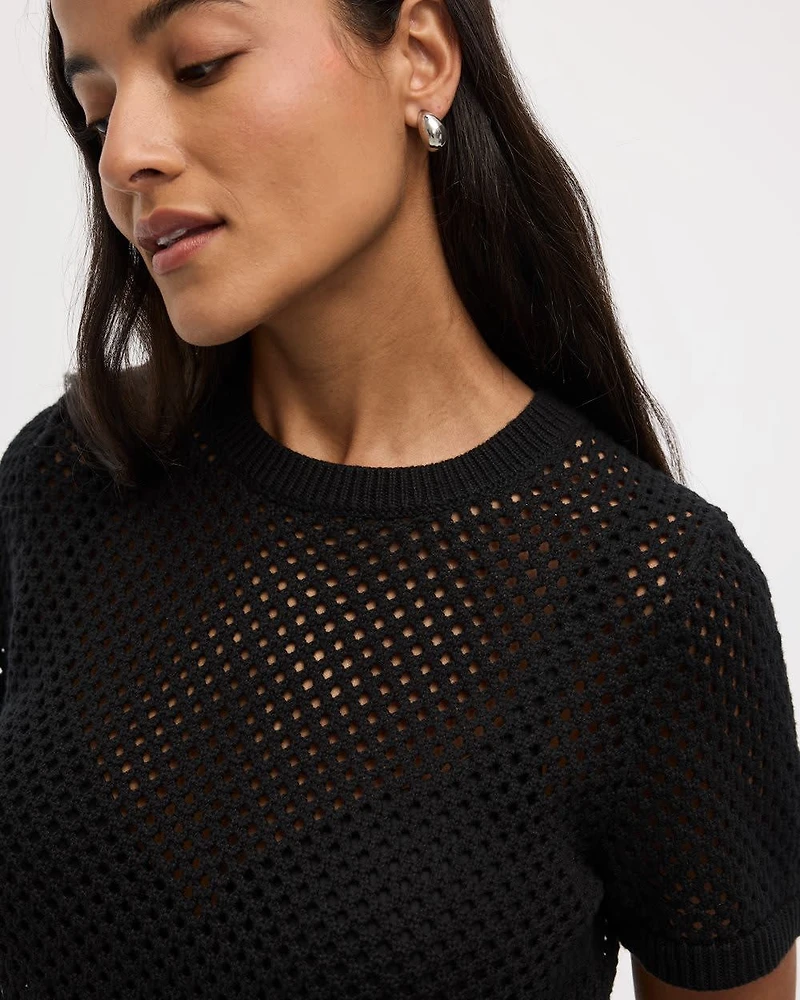 Pull en mailles ajourées à col rond et manches courtes