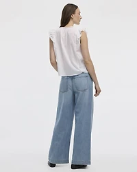 Blouse à col rond et manches très courtes avec broderies