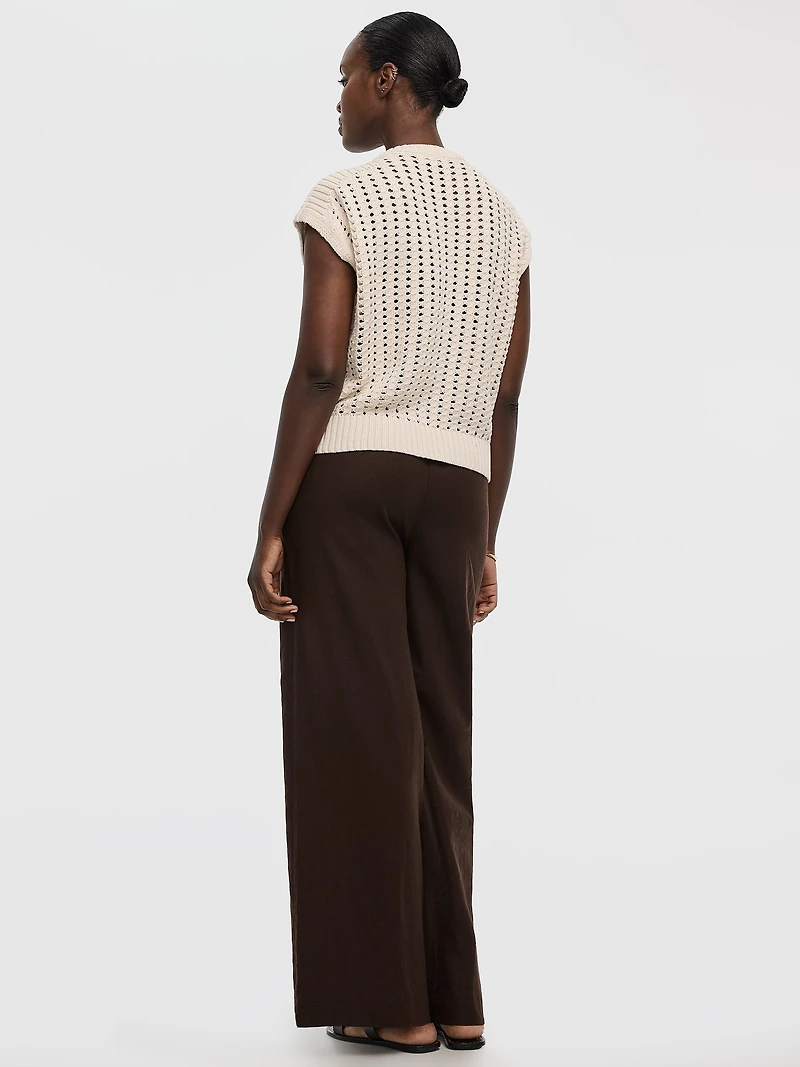 Pull à manches très courtes et col rond en mailles ajourées