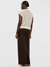 Pull à manches très courtes et col rond en mailles ajourées