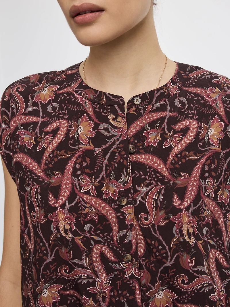 Blouse boutonnée à manches très courtes et col rond