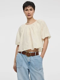 Blouse à oeillets col dégagé et manches aux coudes