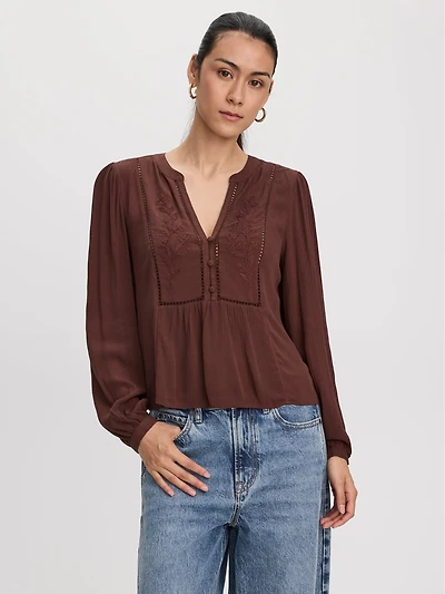 Blouse à manches longues et col fendu avec détails brodés