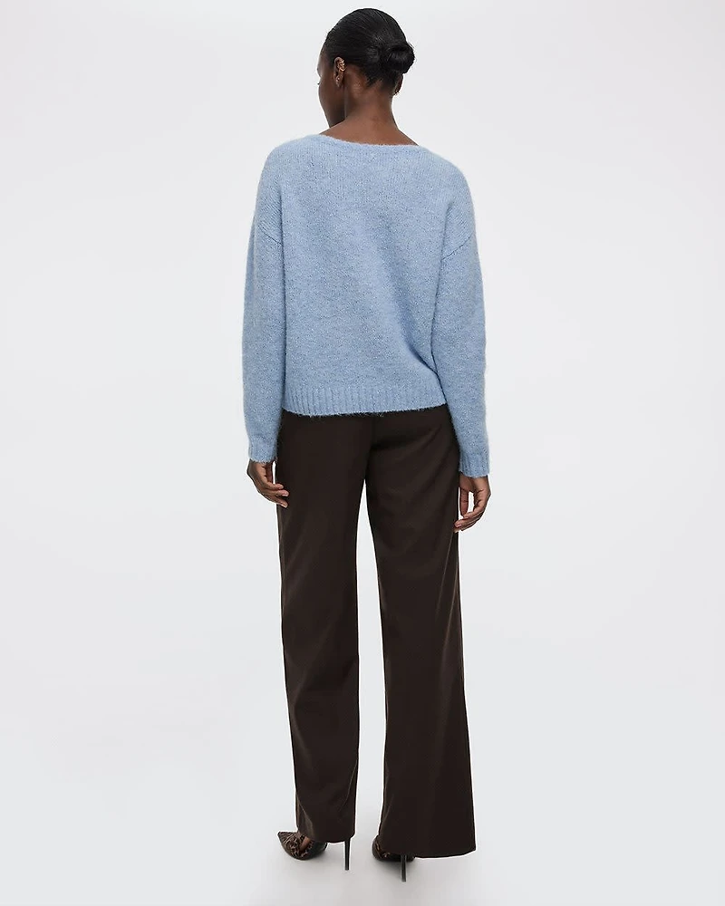 Pull rayé à manches longues et col bateau