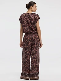 Blouse boutonnée à manches très courtes et col rond