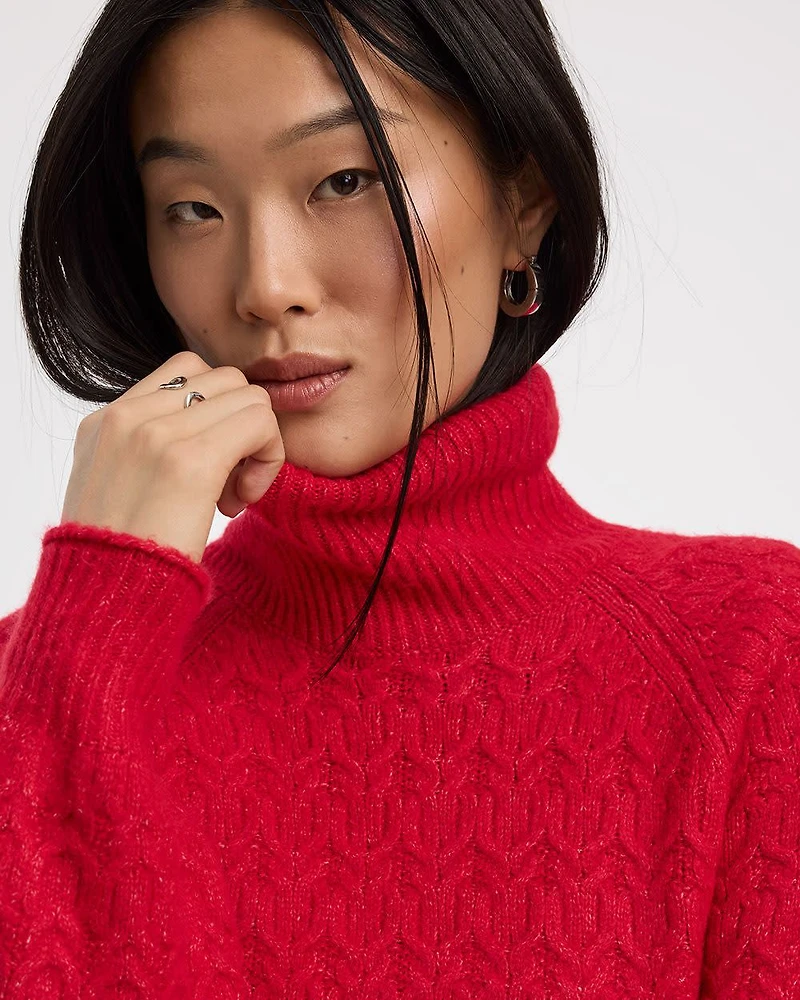 Pull à manches longues bouffantes et col montant