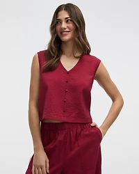 Blouse boutonnée à manches très courtes et col V