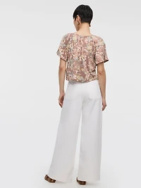 Blouse boutonnée à manches courtes volants et col V