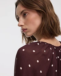 Mini-robe ballon à manches longues bouffantes et col V