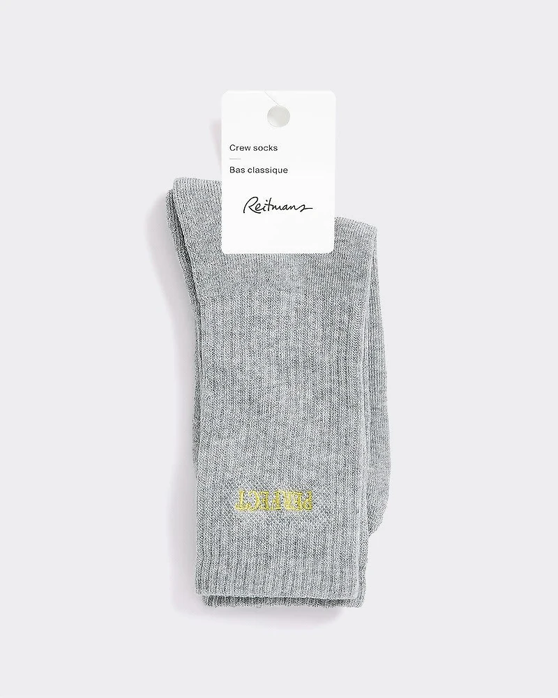 Bas côtelés avec mot à l'ourlet