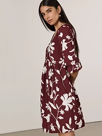 Robe à taille empire manches longues et col V