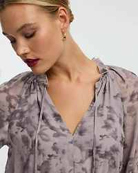 Robe midi à manches longues et col V avec ourlet asymétrique