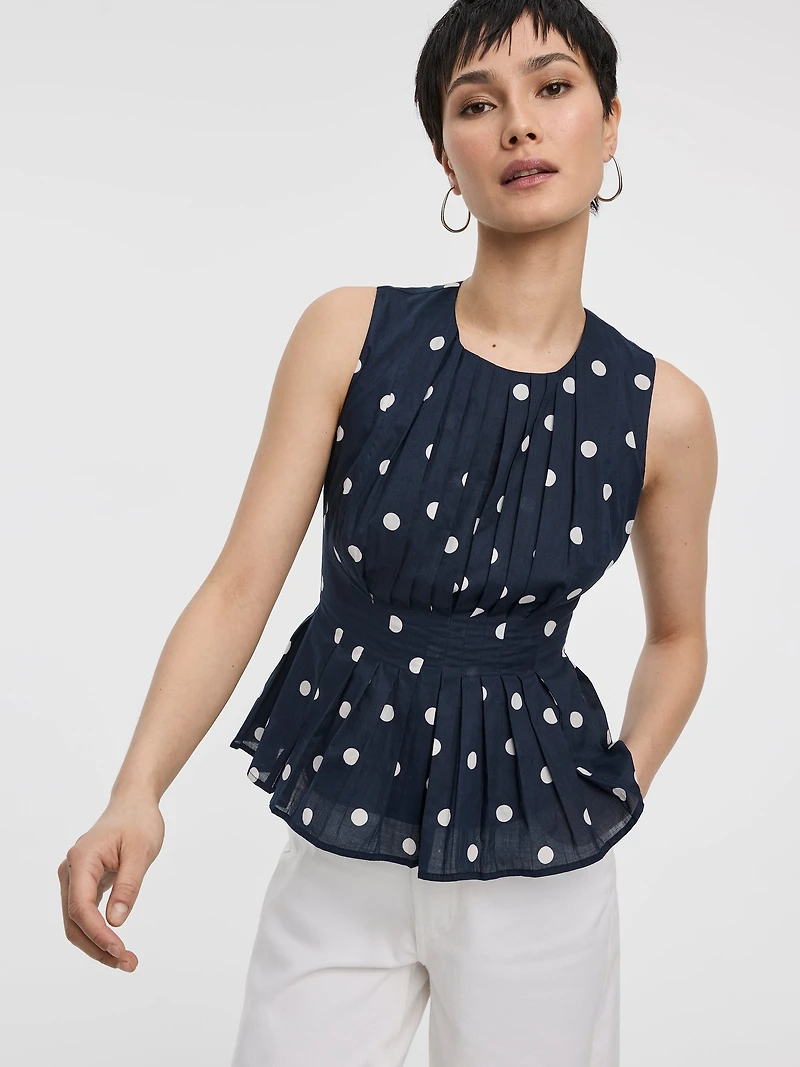 Blouse à plis nervurés sans manches col rond