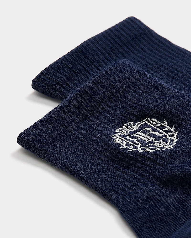 Bas cheville côtelés avec emblème brodé