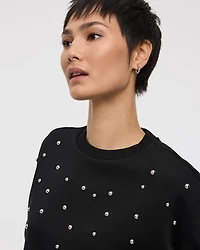 Pull en molleton à manches longues et col rond avec strass