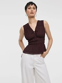 Blouse sans manches à col V avec taille en nid d'abeille
