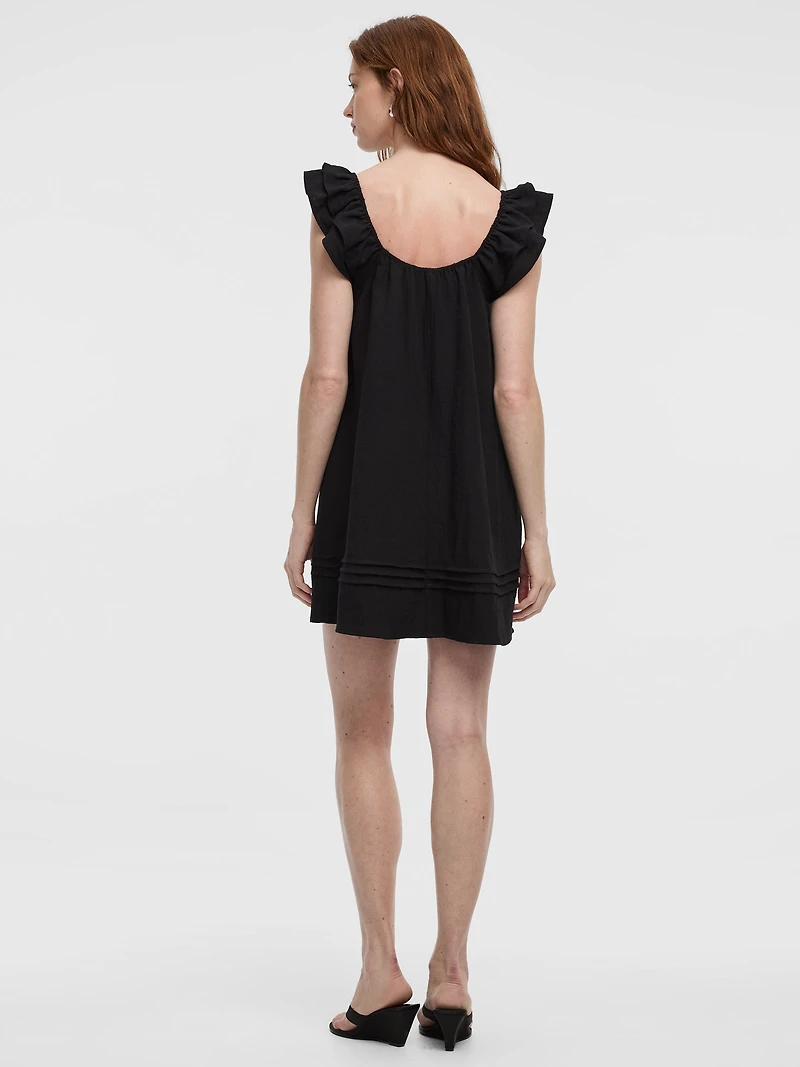 Robe courte à volants et col V