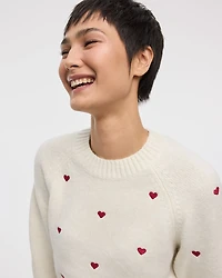 Pull à manches longues et col rond avec coeurs