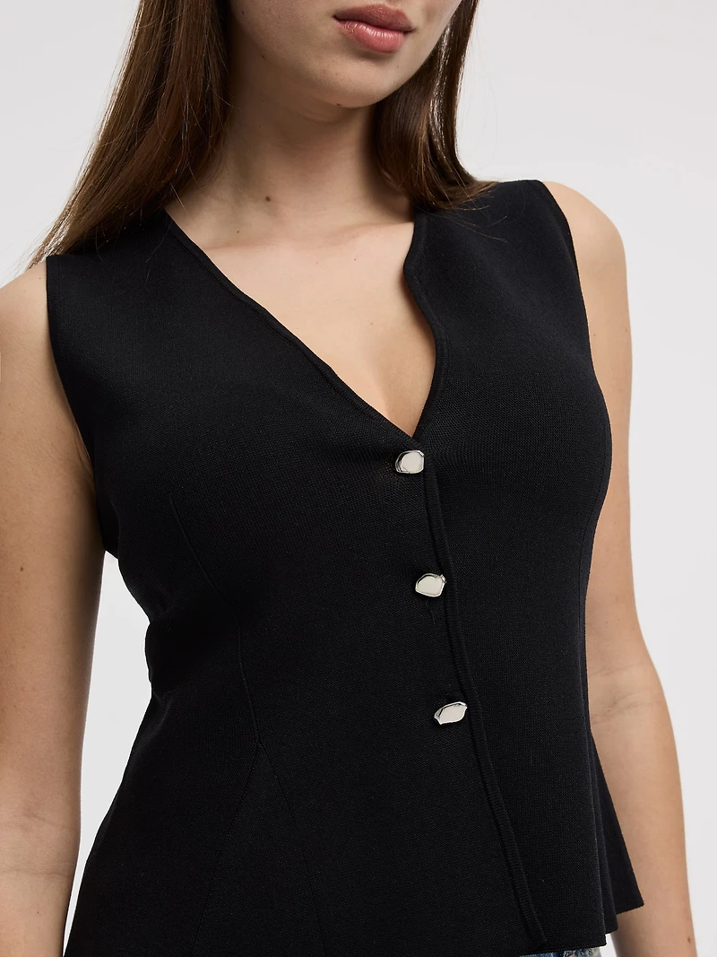 Débardeur en tricot avec ourlet péplum