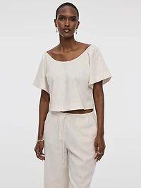 Blouse à manches volants et col dégagé