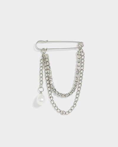 Broche avec pendentifs divers