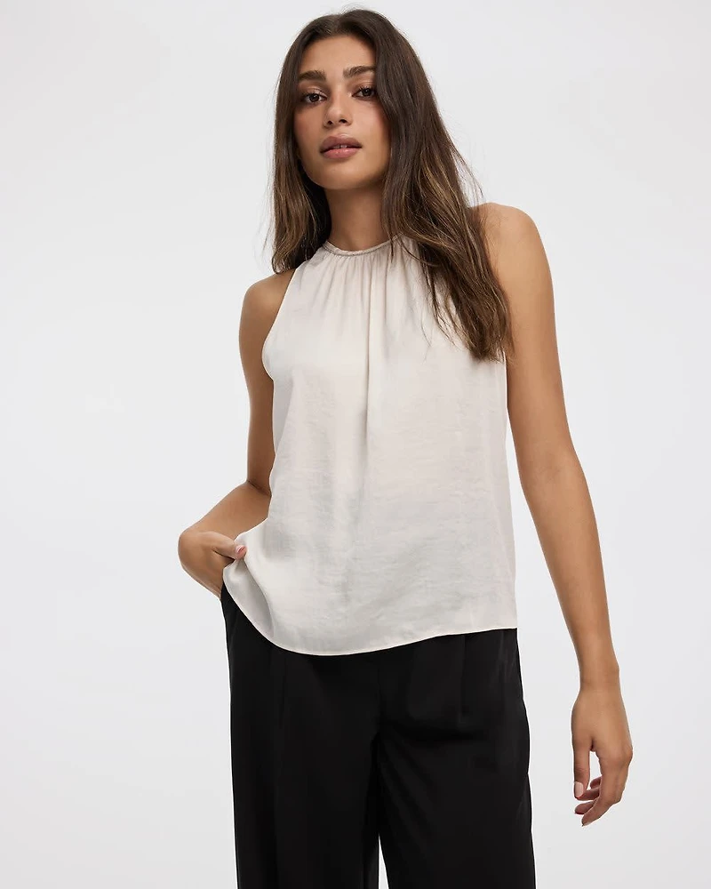 Blouse sans manches à col rond orné de bijoux